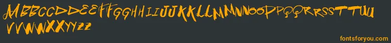 Vtksblowup Font – Orange Fonts on Black Background