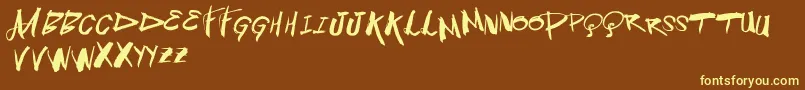 Vtksblowup Font – Yellow Fonts on Brown Background