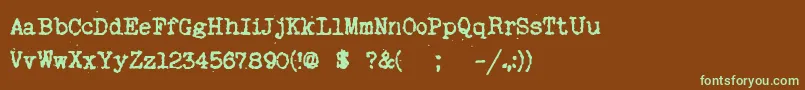 フォントMyOldRemington – 緑色の文字が茶色の背景にあります。