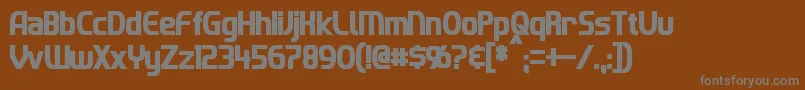 ImakiCondensedBold Font – Gray Fonts on Brown Background