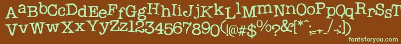 フォントProbsecretary1 – 緑色の文字が茶色の背景にあります。