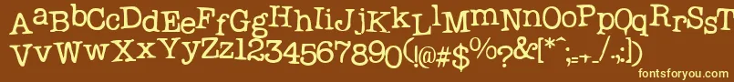 Probsecretary1-fontti – keltaiset fontit ruskealla taustalla