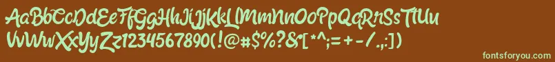 フォントShabrinaRegularFree – 緑色の文字が茶色の背景にあります。