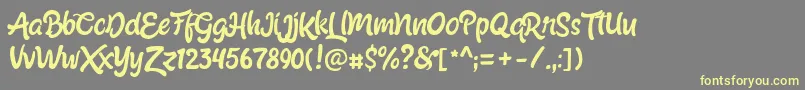 ShabrinaRegularFree-fontti – keltaiset fontit harmaalla taustalla