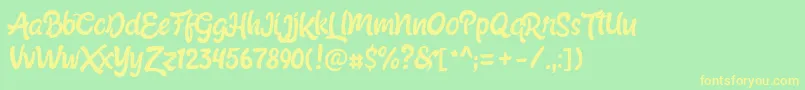 フォントShabrinaRegularFree – 黄色の文字が緑の背景にあります