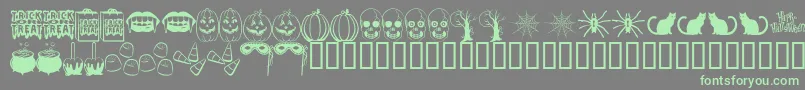 フォントTrictb – 灰色の背景に緑のフォント