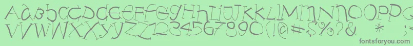 Anarchistica-Schriftart – Graue Schriften auf grünem Hintergrund