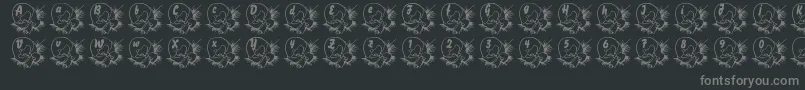 LmsBabyEgg-Schriftart – Graue Schriften auf schwarzem Hintergrund