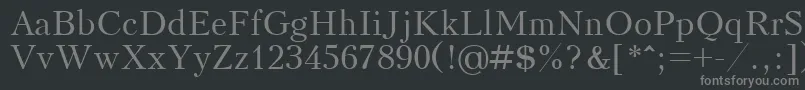 フォントKudrashovctt – 黒い背景に灰色の文字