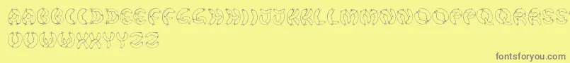 Шрифт DerWurstFont – серые шрифты на жёлтом фоне