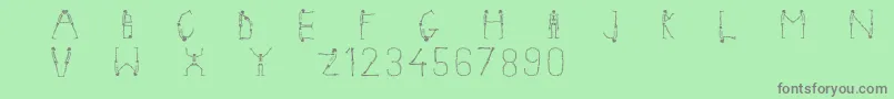 Fonte Skeletonalphabet – fontes cinzas em um fundo verde