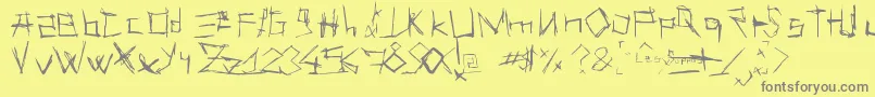 LesSuppos-fontti – harmaat kirjasimet keltaisella taustalla
