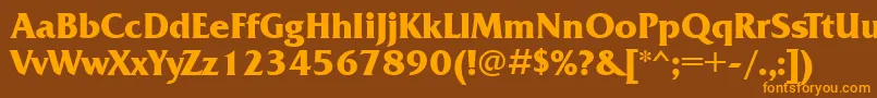 フォントFrq85C – オレンジ色の文字が茶色の背景にあります。