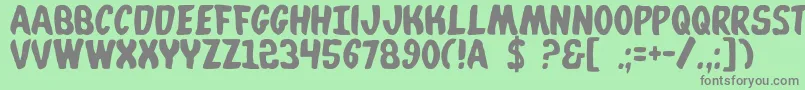 フォントWhata – 緑の背景に灰色の文字