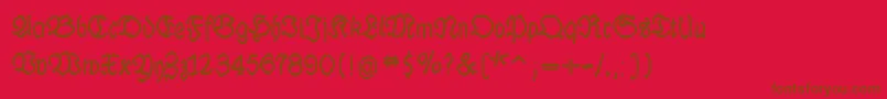 LuthermousedrawnBold-Schriftart – Braune Schriften auf rotem Hintergrund