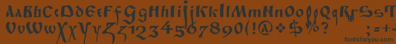 Fitapoluustavc Font – Black Fonts on Brown Background
