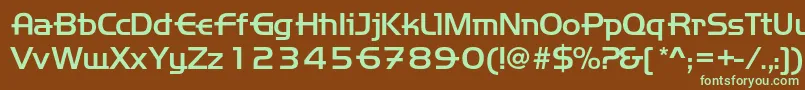 フォントHandemed – 緑色の文字が茶色の背景にあります。