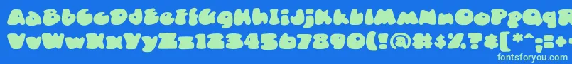 DuncecapBb Font – Green Fonts on Blue Background