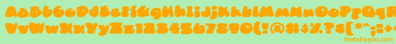 DuncecapBb-Schriftart – Orangefarbene Schriften auf grünem Hintergrund