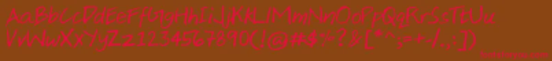 AjiHand Font – Red Fonts on Brown Background