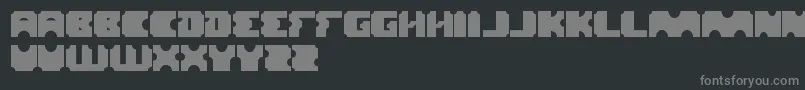 Logotype-fontti – harmaat kirjasimet mustalla taustalla