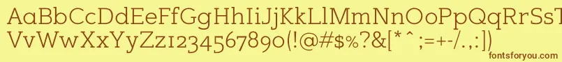 フォントSugarcubesregular – 茶色の文字が黄色の背景にあります。