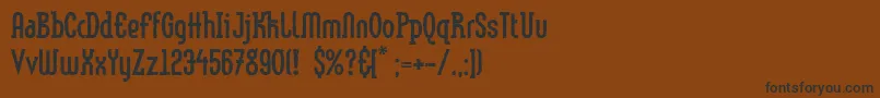 フォントLinotypemethodEroded – 黒い文字が茶色の背景にあります