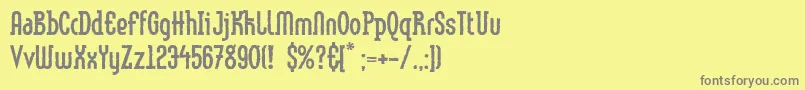 Fonte LinotypemethodEroded – fontes cinzas em um fundo amarelo