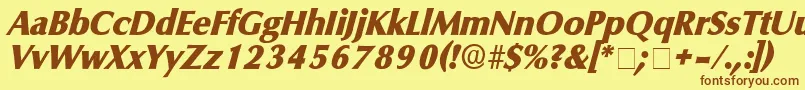 フォントGlyphSsiItalic – 茶色の文字が黄色の背景にあります。