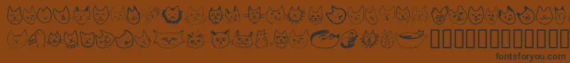 Linufa-Schriftart – Schwarze Schriften auf braunem Hintergrund