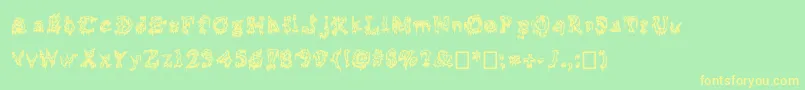 Squelettics Font – Yellow Fonts on Green Background