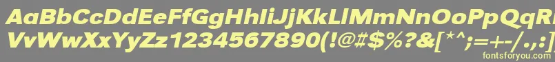 UrwgrotesktextwidBoldOblique-fontti – keltaiset fontit harmaalla taustalla
