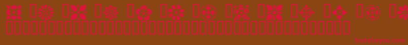 VictorianDesignsOne Font – Red Fonts on Brown Background