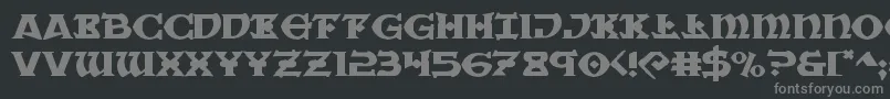 フォントWarpriestexpand – 黒い背景に灰色の文字