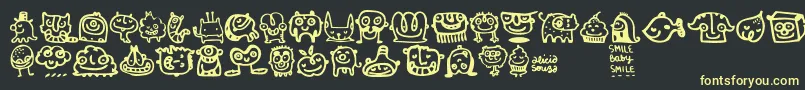 フォントSmilebaby – 黒い背景に黄色の文字