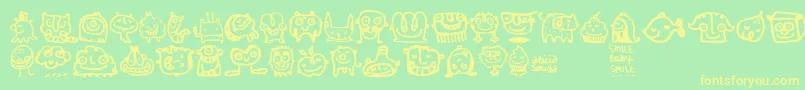 Smilebaby Font – Yellow Fonts on Green Background