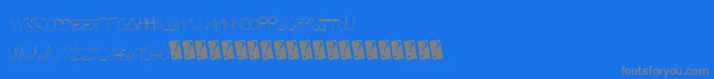 Futuregirlfriend-fontti – harmaat kirjasimet sinisellä taustalla