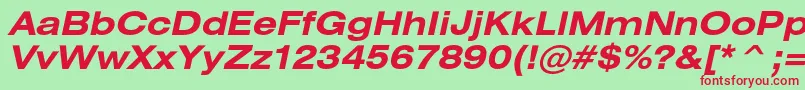 HeliosextBoldItalic-fontti – punaiset fontit vihreällä taustalla