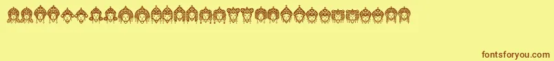 Headofidol Font – Brown Fonts on Yellow Background