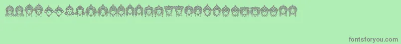 Headofidol Font – Gray Fonts on Green Background