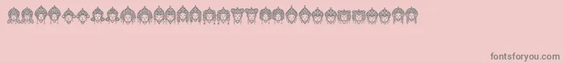 Fonte Headofidol – fontes cinzas em um fundo rosa