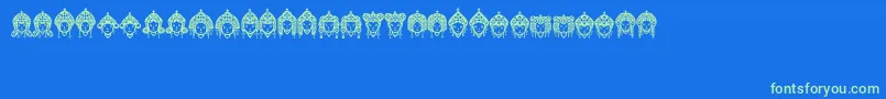 Headofidol Font – Green Fonts on Blue Background