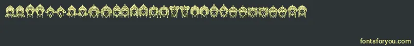 Headofidol Font – Yellow Fonts on Black Background