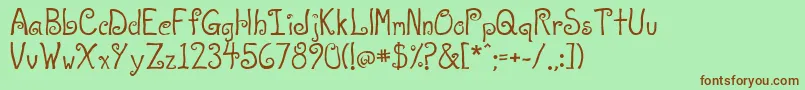 A T Love-fontti – ruskeat fontit vihreällä taustalla