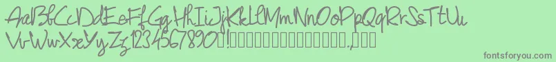 フォントPwjunescript – 緑の背景に灰色の文字