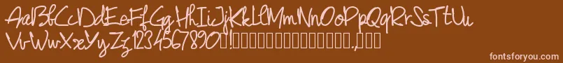 フォントPwjunescript – 茶色の背景にピンクのフォント