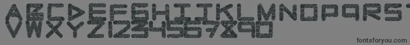 フォントNaughtypipe – 黒い文字の灰色の背景