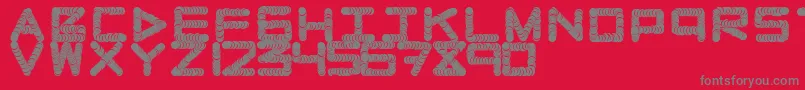 Naughtypipe Font – Gray Fonts on Red Background