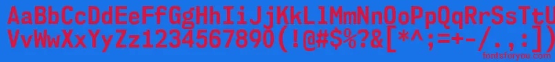 Nk57MonospaceScBd Font – Red Fonts on Blue Background