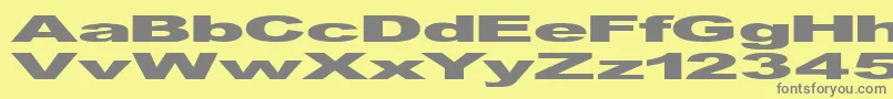 GfViennaHeavy-fontti – harmaat kirjasimet keltaisella taustalla